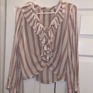 white blouse w/ red and black vertical stripes